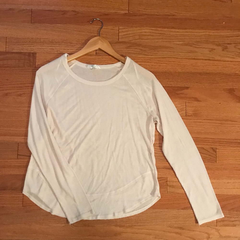 Loose fitting light pink top